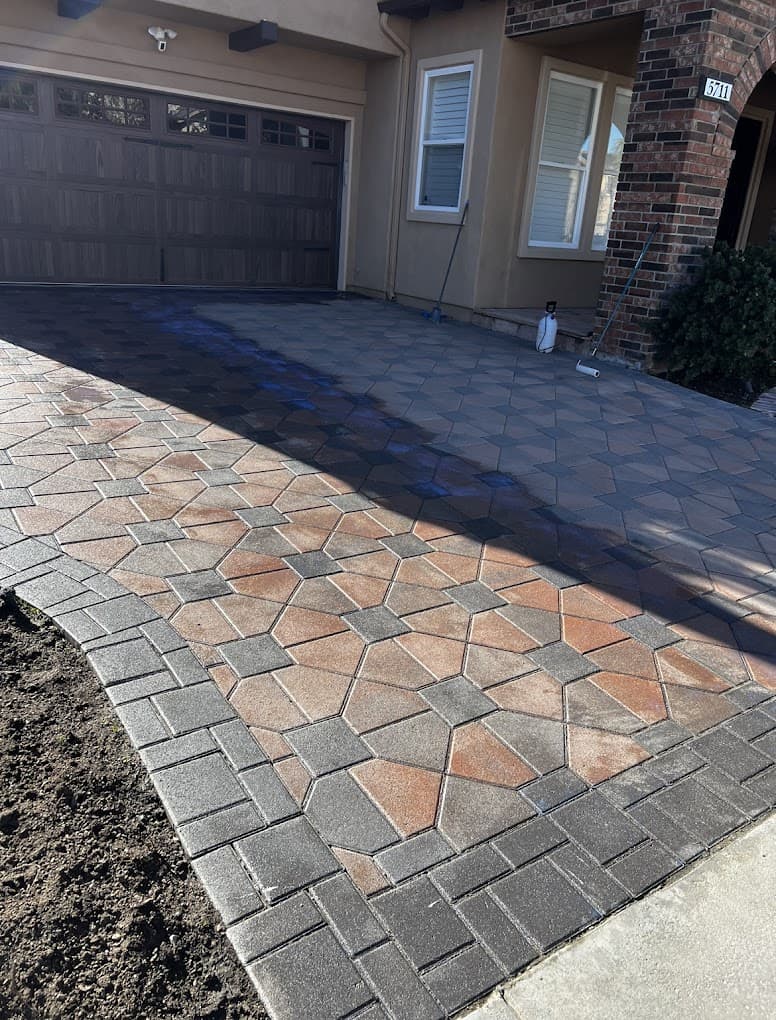 Pressure washing a driveway